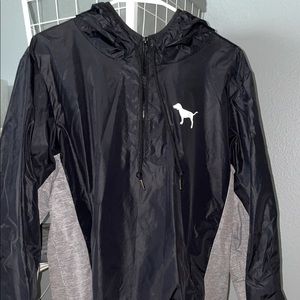 black and grey windbreaker